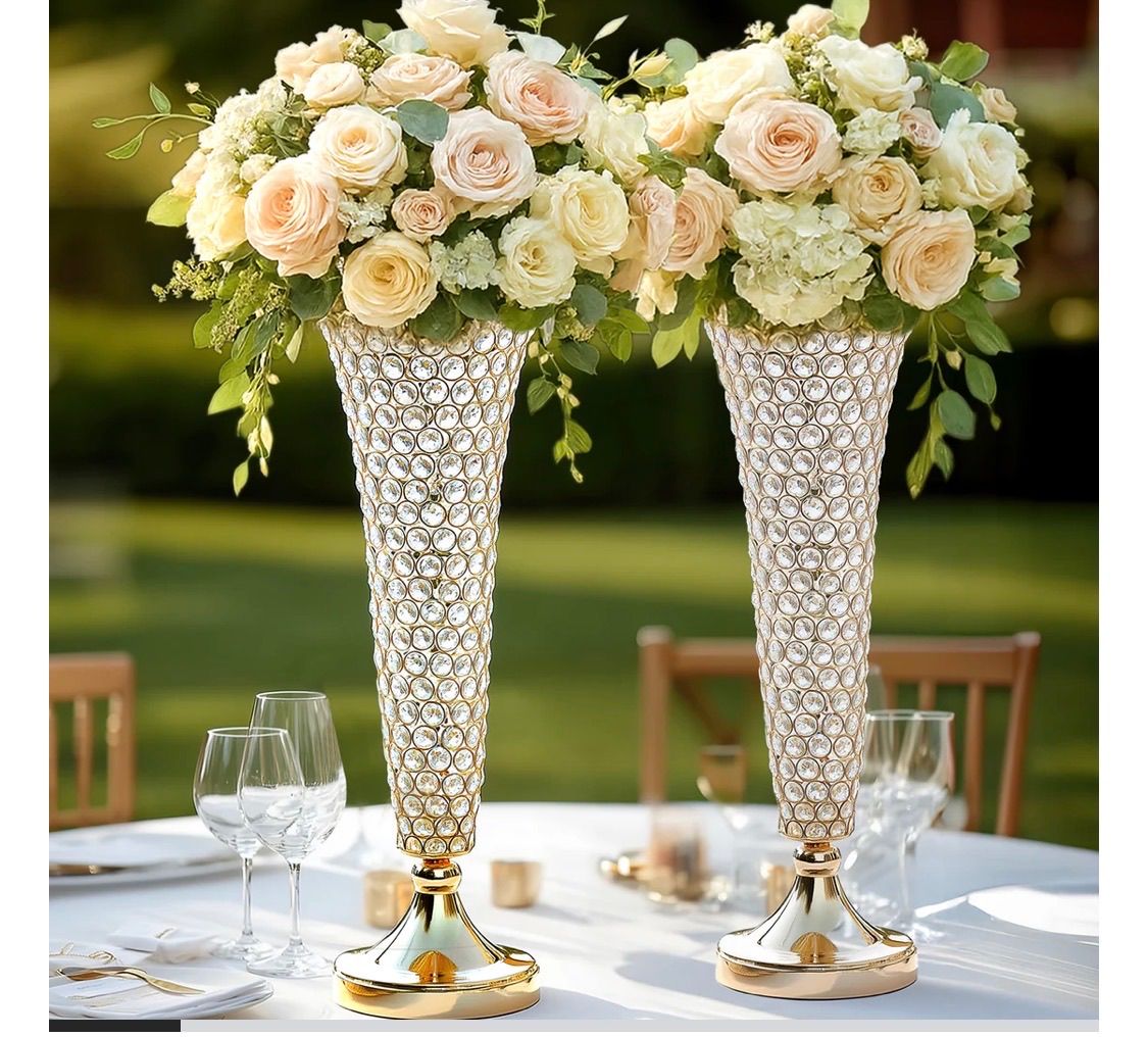Gold rhinestone vases arranged for an upscale floral display