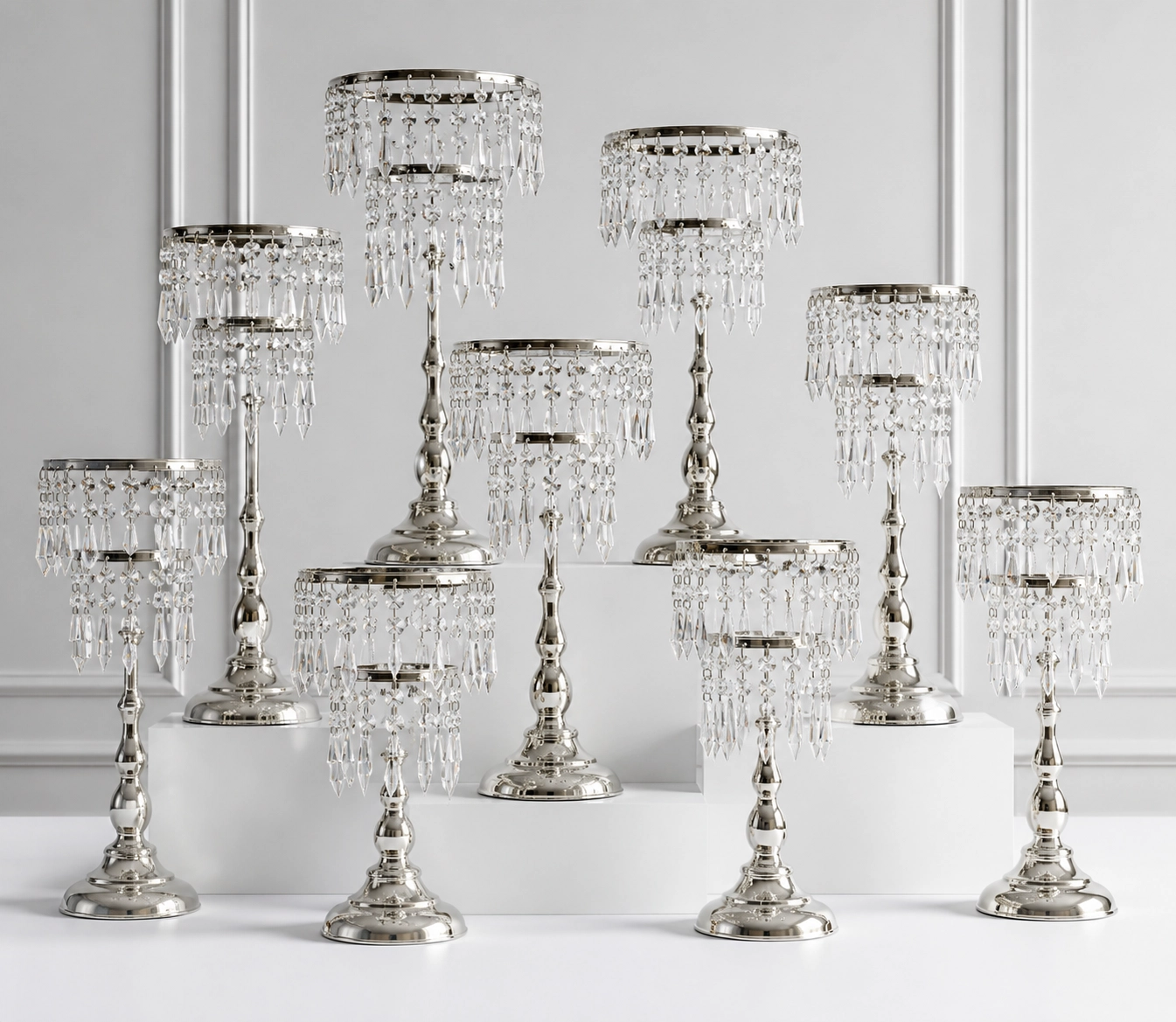 Crystal-drop centerpiece stands arranged as an event rental collection