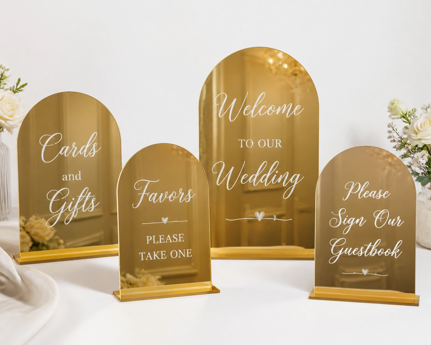 Gold mirrored wedding signage pieces for welcome, guestbook, and gifts