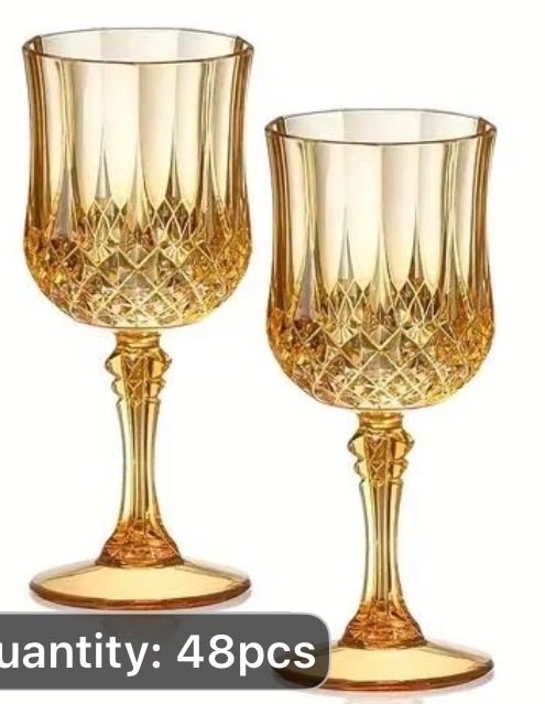 Old gold goblets arranged for formal event table settings