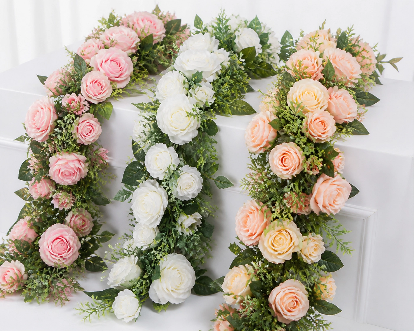 Blush, white, and soft-peach rose garlands